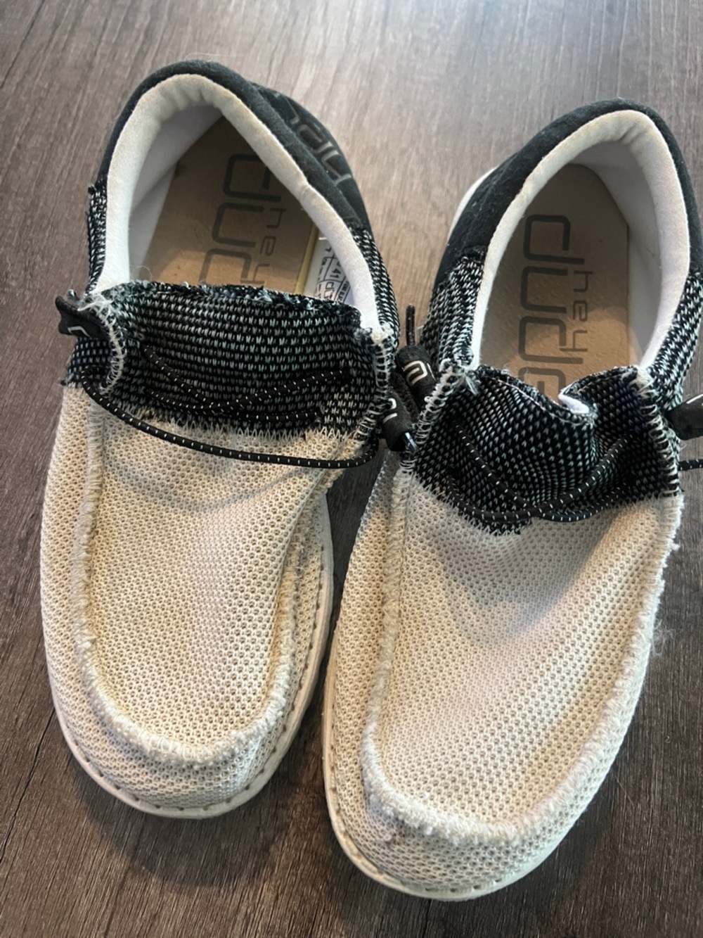 Hey Dude mens Slip-On Sneakers in White and Black